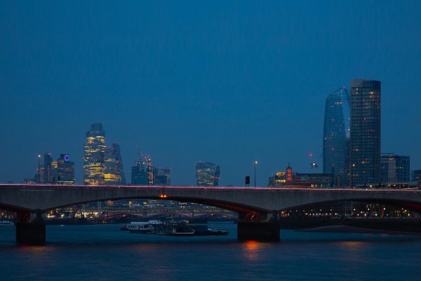 View of Blackfriars Bridge from Waterloo Bridge at blue hour.