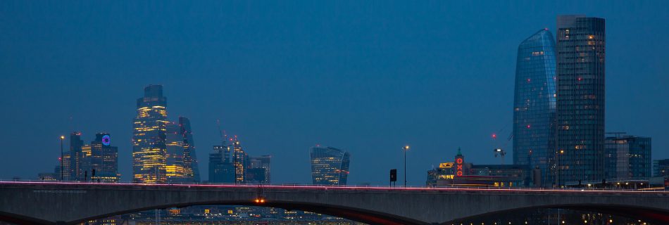View of Blackfriars Bridge from Waterloo Bridge at blue hour.